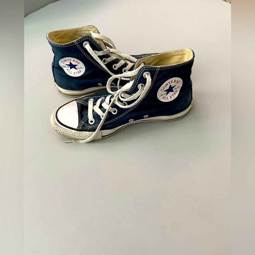 Navy blue high top converse